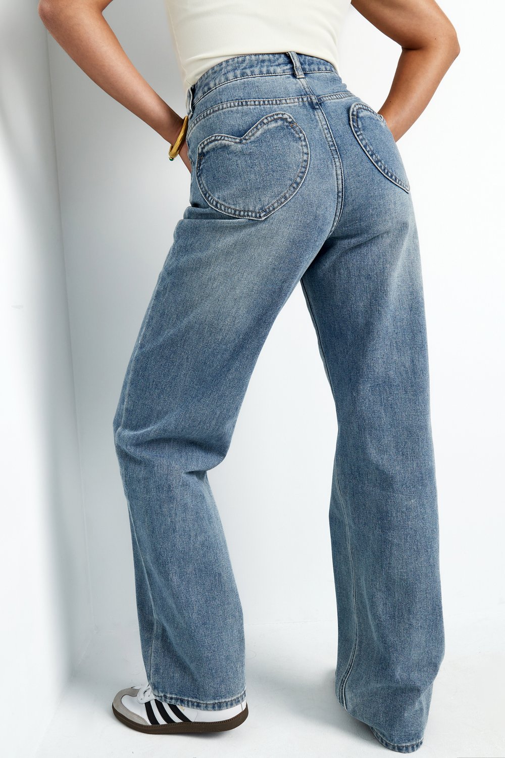 Jeans con tasche a forma di cuore